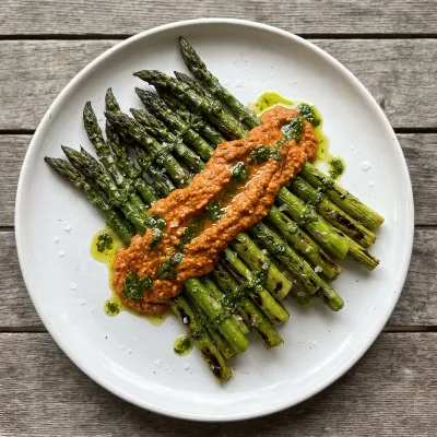 Grilled Asparagus with Walnut Romesco and Fresh Herb Oil